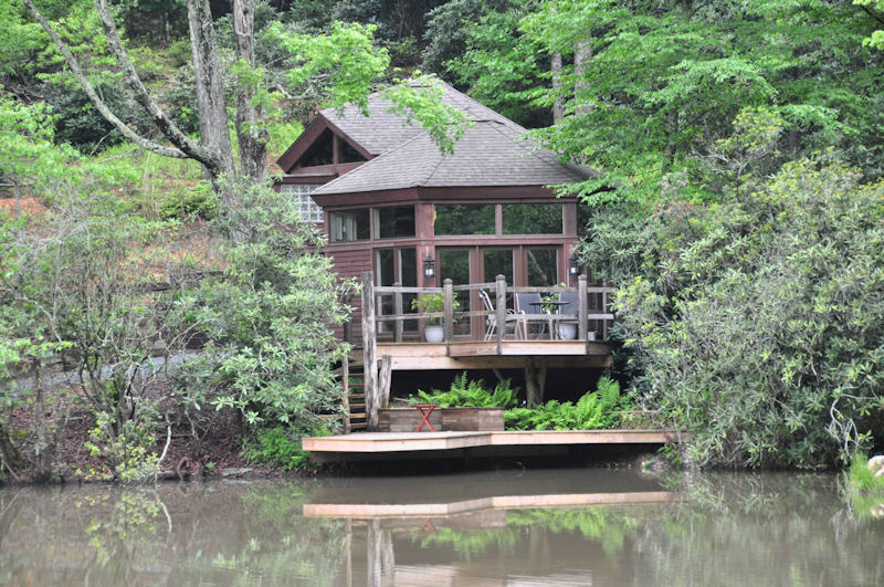 Cabin by a pond